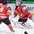 MINSK, BELARUS - MAY 16: Canada's James Reimer #34 reaches for a loose puck against Team Italy during preliminary round action at the 2014 IIHF Ice Hockey World Championship. (Photo by Richard Wolowicz/HHOF-IIHF Images)